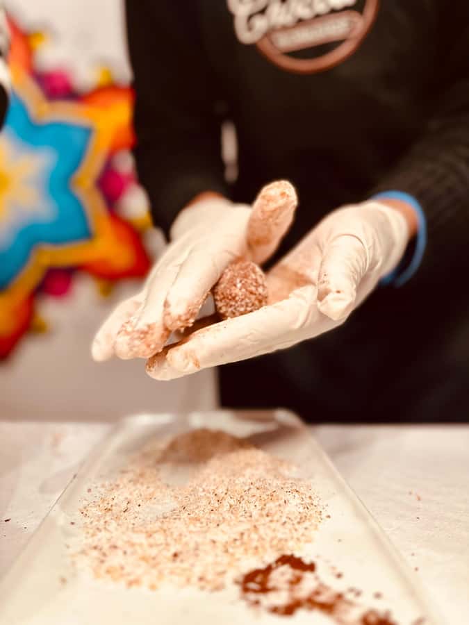 1.5h Cusco Chocolate Workshop - Truffles & Hot Chocolate - Choosing toppings and shaping your chocolates