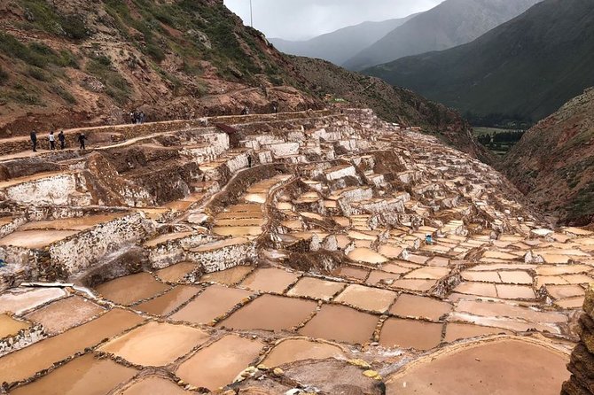 Complete Sacred Valley Tour Small group Pisac, Maras, Moray & Ollantaytambo - Maras salt pools: a bright patchwork on the mountain