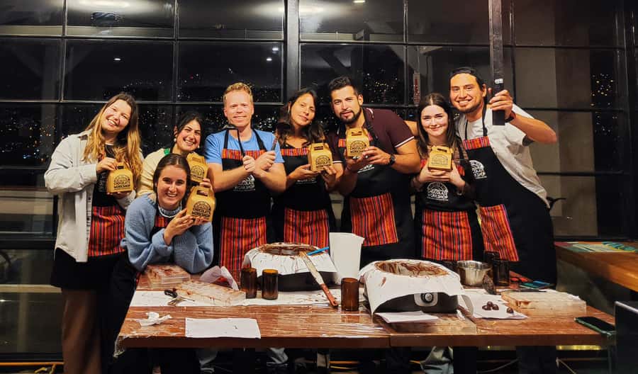 Cusco: Chocolate Workshop with the Best Local Organic Cacao - Tempering chocolate and building the shells