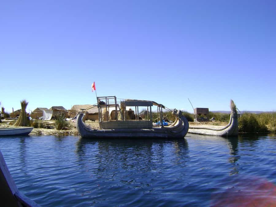 From Cusco: 2-Day Lake Titicaca Tour - An early boat to the Uros Islands