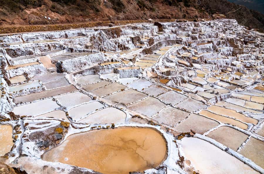 From Ollantaytambo:Private tour to Maras and Moray half day - Maras and its hillside salt pans